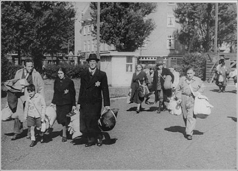 Jews proceed to an assembly point before deportation from Amsterdam